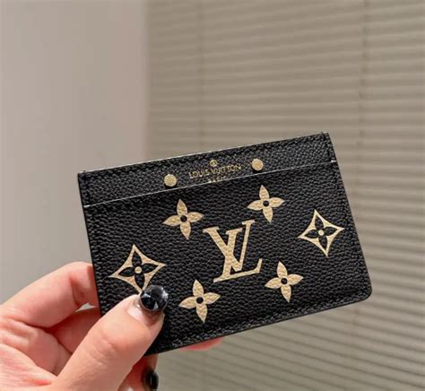 salvatore ferragamo vs louis vuitton wallet